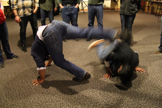 Craig and Arvind playing capoeira at UptoAllofUs 2014